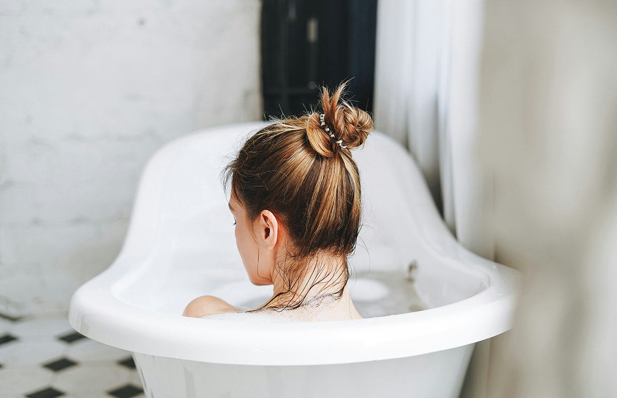 A girl taking a bath