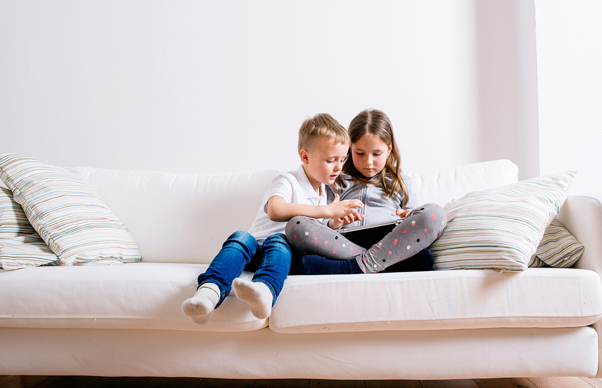 Kids playing with a tablet 