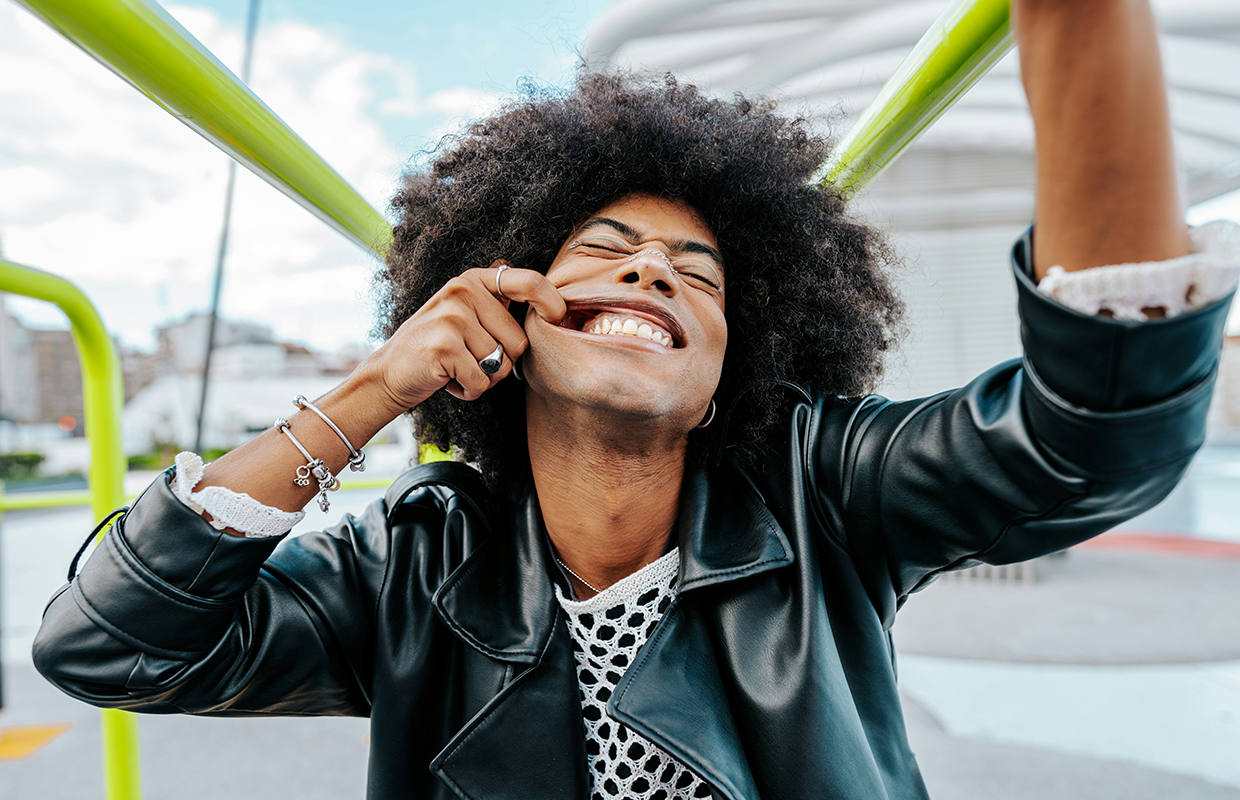 A man pulling his face 